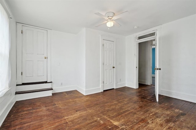 624 N Wentz St, Guthrie, OK 73044 - unfurnished bedroom with baseboards, hardwood / wood-style floors, and a ceiling fan