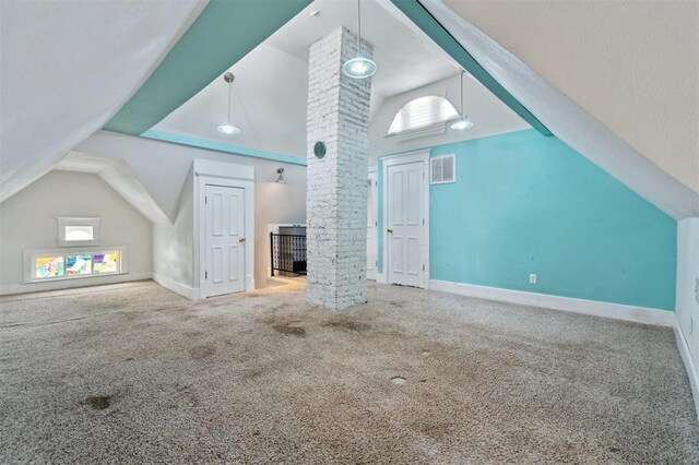 624 N Wentz St, Guthrie, OK 73044 - bonus room with lofted ceiling, carpet flooring, decorative columns, plenty of natural light, and baseboards