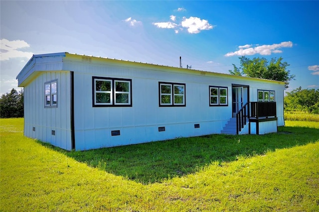 101869 S 3570th Rd, Prague, OK 74864 - back of house featuring crawl space and a lawn
