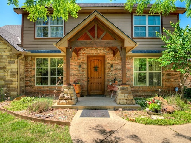 19401 N Peebly Rd, Luther, OK 73054 - doorway to property with roof with shingles and brick siding