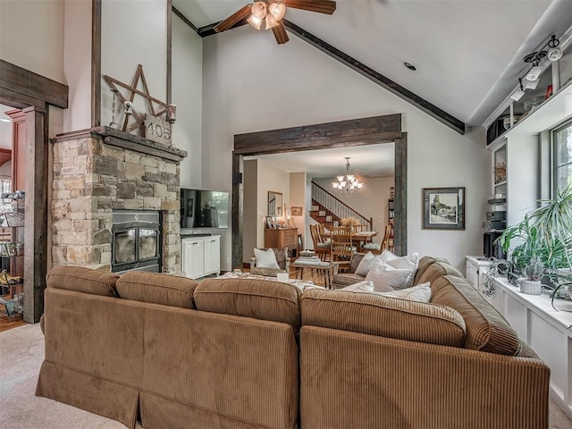 19401 N Peebly Rd, Luther, OK 73054 - living room with a stone fireplace, lofted ceiling, a chandelier, a ceiling fan, and carpet