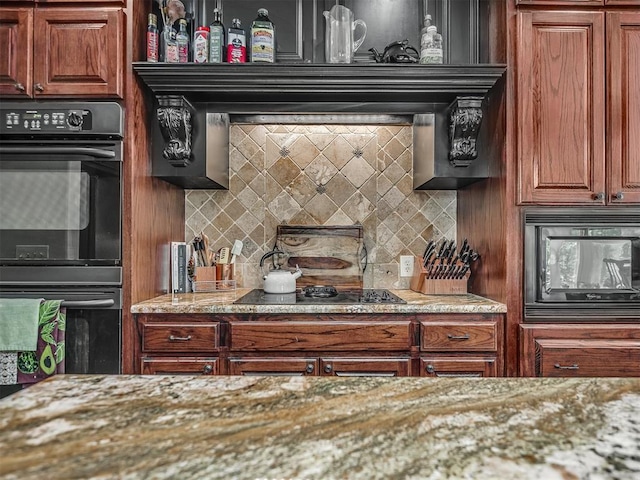 19401 N Peebly Rd, Luther, OK 73054 - kitchen with black appliances, decorative backsplash, light stone counters, and brown cabinets