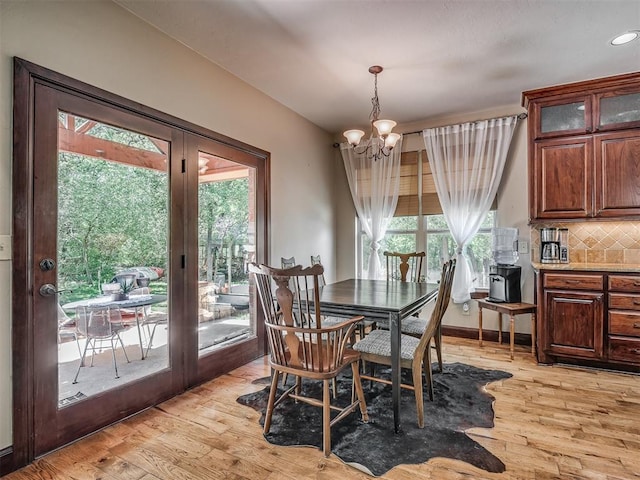 19401 N Peebly Rd, Luther, OK 73054 - dining area featuring a chandelier and light wood finished floors