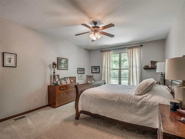 19401 N Peebly Rd, Luther, OK 73054 - bedroom featuring light carpet, baseboards, and ceiling fan