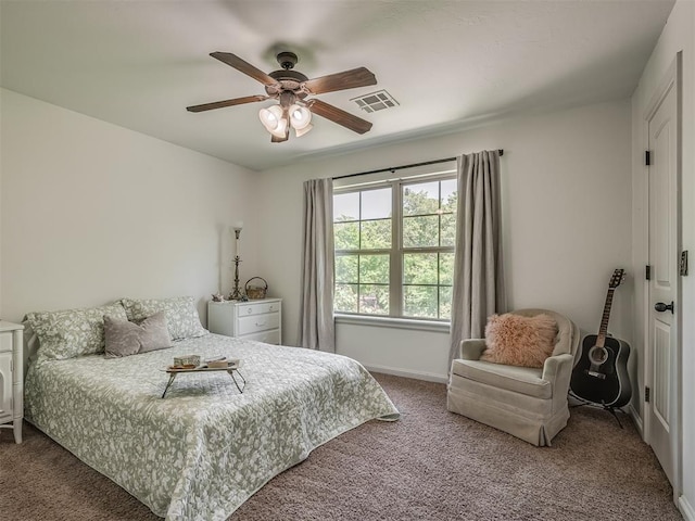 19401 N Peebly Rd, Luther, OK 73054 - bedroom with carpet flooring, ceiling fan, and baseboards