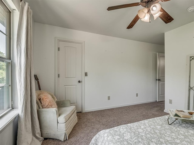 19401 N Peebly Rd, Luther, OK 73054 - carpeted bedroom featuring baseboards and a ceiling fan