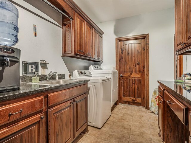 19401 N Peebly Rd, Luther, OK 73054 - washroom with cabinet space, light tile patterned flooring, and separate washer and dryer