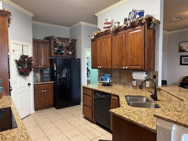1912 SE 18th St, Moore, OK 73160 - kitchen featuring black appliances, a sink, tasteful backsplash, crown molding, and light tile patterned floors