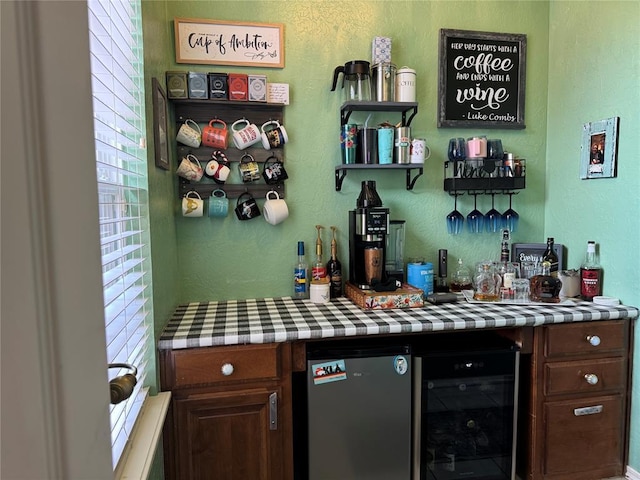 1912 SE 18th St, Moore, OK 73160 - indoor dry bar featuring beverage cooler, fridge, and a textured wall