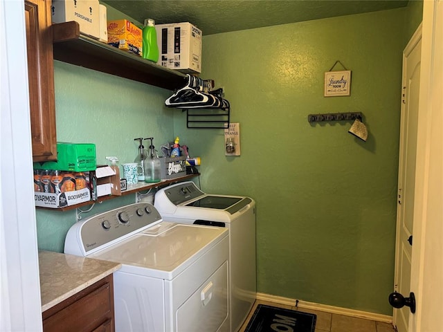 1912 SE 18th St, Moore, OK 73160 - laundry room with independent washer and dryer, cabinet space, tile patterned flooring, and baseboards