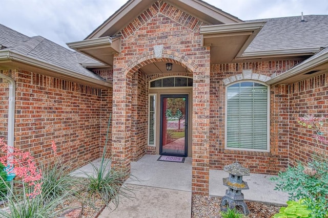 5524 SE 57th St, Oklahoma City, OK 73135 - property entrance with brick siding and a shingled roof