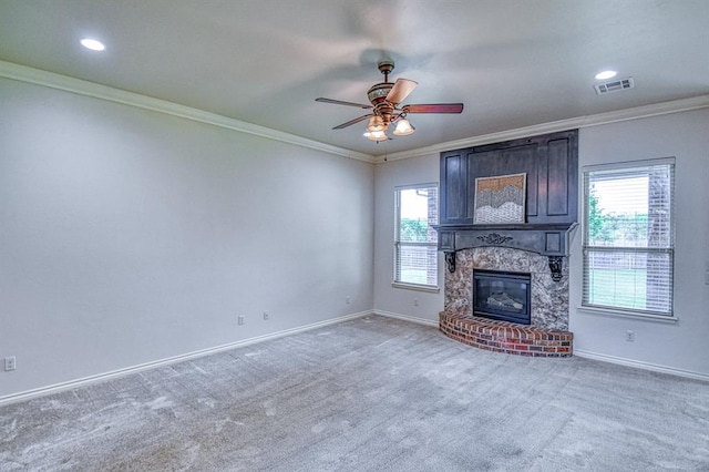 5524 SE 57th St, Oklahoma City, OK 73135 - unfurnished living room with crown molding, a ceiling fan, a brick fireplace, baseboards, and carpet floors
