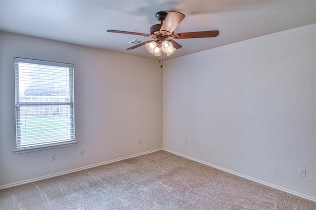 5524 SE 57th St, Oklahoma City, OK 73135 - empty room featuring plenty of natural light, a ceiling fan, carpet flooring, and baseboards