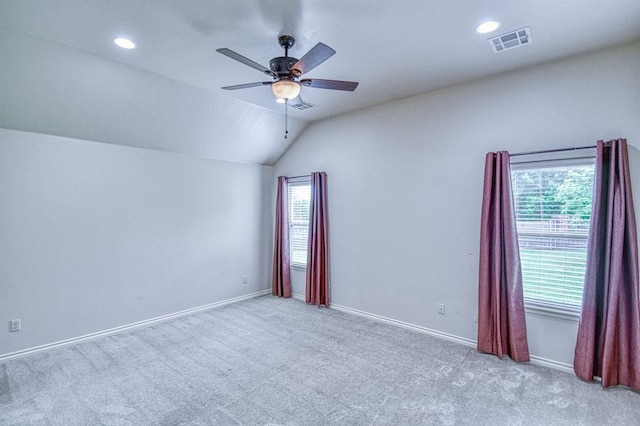 5524 SE 57th St, Oklahoma City, OK 73135 - carpeted spare room featuring plenty of natural light, lofted ceiling, ceiling fan, baseboards, and recessed lighting