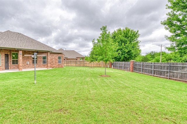 5524 SE 57th St, Oklahoma City, OK 73135 - view of yard featuring a patio area