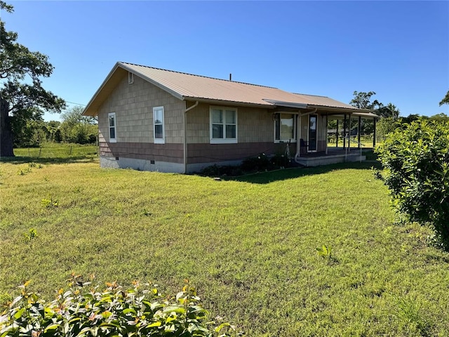 4443 Apperson Rd, Burbank, OK 74633 - back of house with crawl space, a lawn, and metal roof