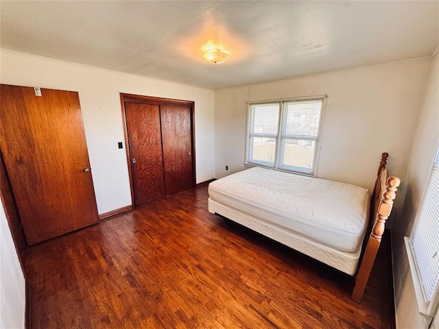 4443 Apperson Rd, Burbank, OK 74633 - bedroom featuring wood finished floors and baseboards