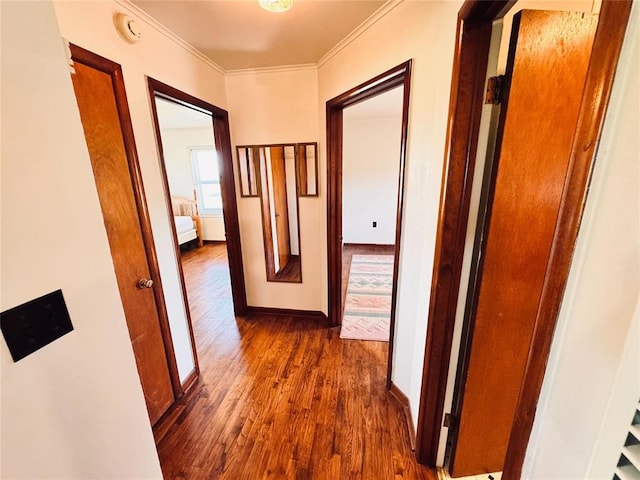 4443 Apperson Rd, Burbank, OK 74633 - hallway with dark wood-style floors, ornamental molding, and baseboards