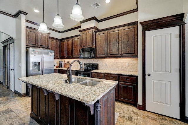 19009 Meadows Crossing Dr, Edmond, OK 73012 - kitchen with black appliances, a sink, ornamental molding, baseboards, and dark brown cabinetry