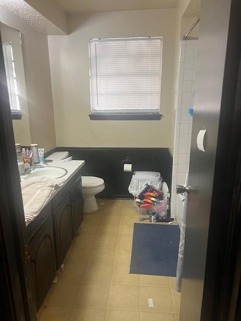5229 S Briarwood Dr, Oklahoma City, OK 73135 - bathroom with vanity, toilet, and a shower