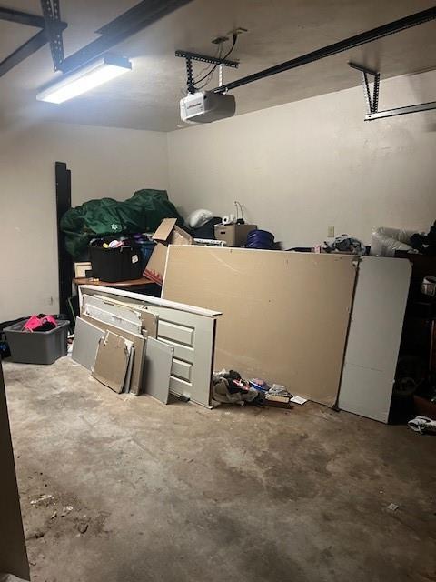 1826 S Stonewall Ave, Oklahoma City, OK 73114 - garage featuring a garage door opener