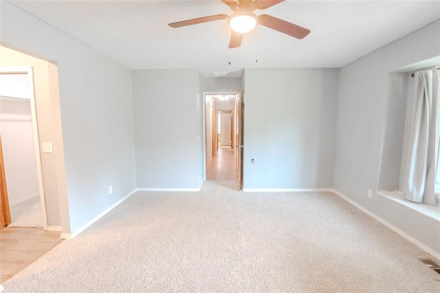 5821 NW 89th St, Oklahoma City, OK 73132 - spare room with light colored carpet, a ceiling fan, attic access, and baseboards