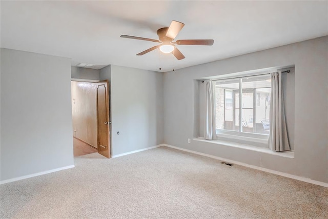5821 NW 89th St, Oklahoma City, OK 73132 - carpeted empty room with ceiling fan and baseboards