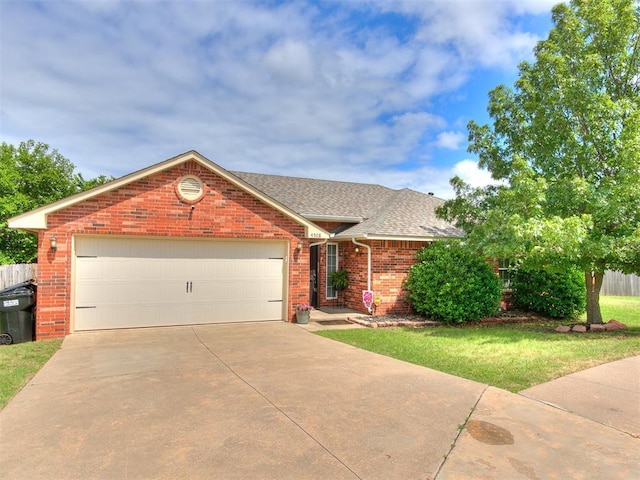 4508 Applegate Dr, Moore, OK 73160 - view of front facade featuring brick siding, a shingled roof, concrete driveway, and a garage