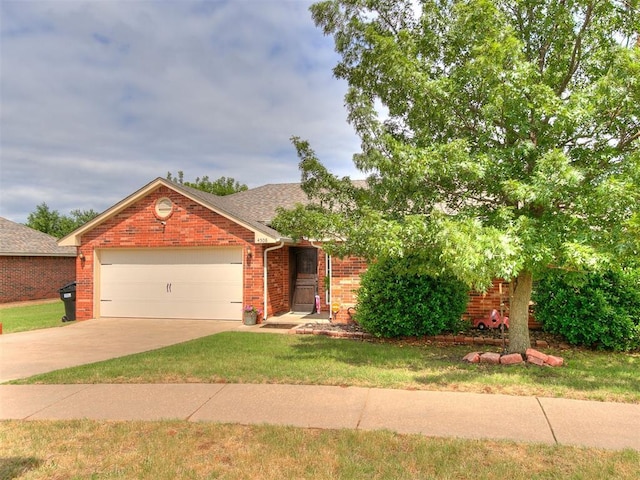 4508 Applegate Dr, Moore, OK 73160 - view of front of home featuring driveway, a garage, brick siding, a front yard, and roof with shingles