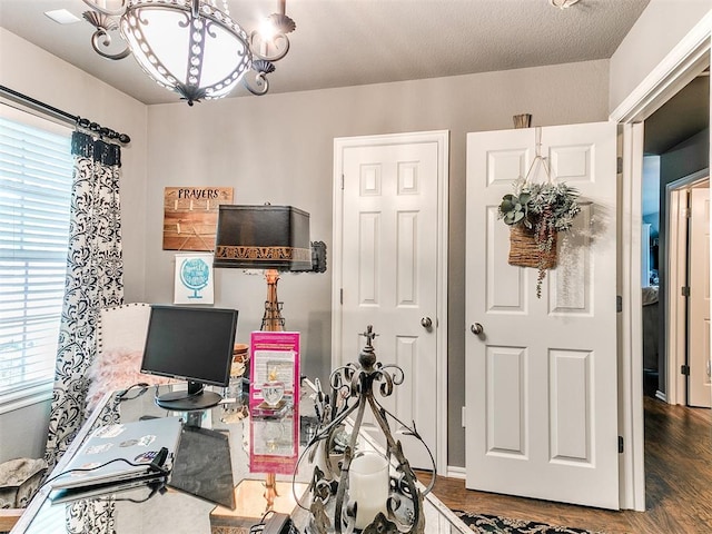 4508 Applegate Dr, Moore, OK 73160 - office area featuring a chandelier, healthy amount of natural light, and wood finished floors