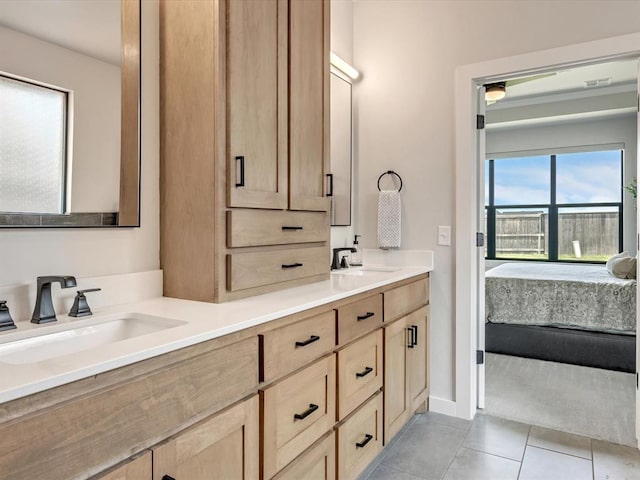 4315 Dusty Trl, Norman, OK 73072 - ensuite bathroom featuring double vanity and tile patterned flooring