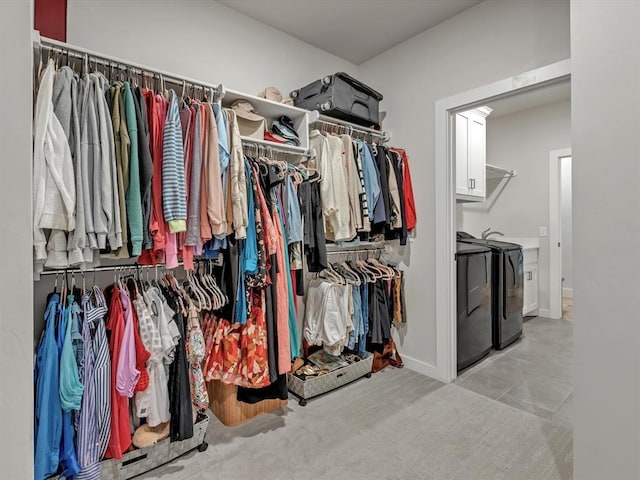 4315 Dusty Trl, Norman, OK 73072 - walk in closet featuring washing machine and clothes dryer