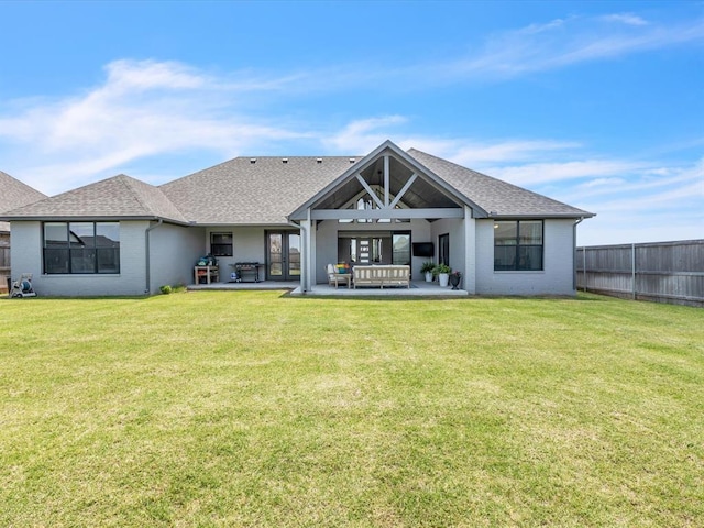 4315 Dusty Trl, Norman, OK 73072 - rear view of house with a shingled roof, a patio, and french doors
