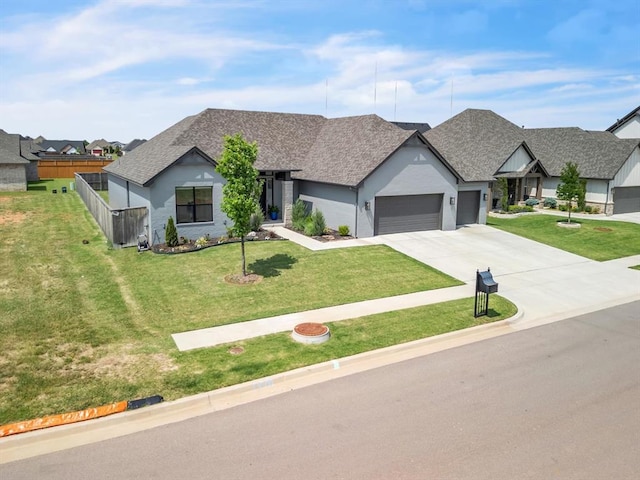 4315 Dusty Trl, Norman, OK 73072 - view of front of house with a garage, roof with shingles, concrete driveway, and a residential view