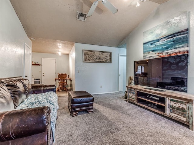 11379 Kirkwin Ln, Choctaw, OK 73020 - carpeted living area featuring lofted ceiling and ceiling fan