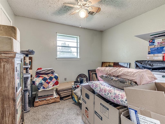 11379 Kirkwin Ln, Choctaw, OK 73020 - carpeted bedroom featuring a textured ceiling and a ceiling fan