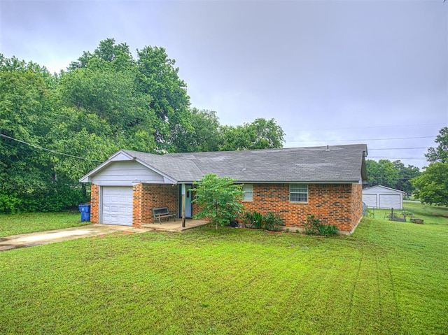11379 Kirkwin Ln, Choctaw, OK 73020 - ranch-style house featuring driveway, brick siding, a front lawn, an attached garage, and roof with shingles