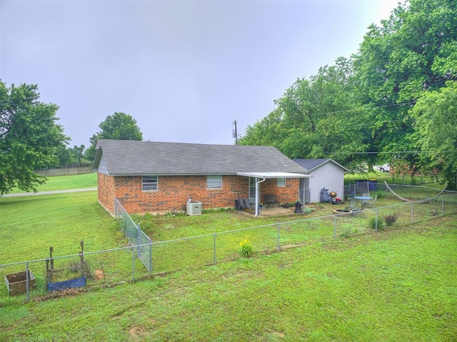 11379 Kirkwin Ln, Choctaw, OK 73020 - back of house featuring brick siding
