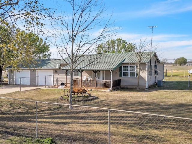 35345 Ew 1240th Rd, Seminole, OK 74868 - single story home with driveway, a porch, metal roof, an attached garage, and central AC unit