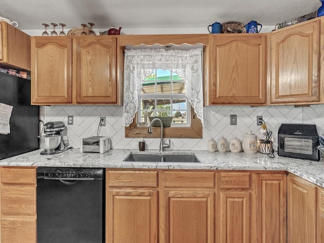 35345 Ew 1240th Rd, Seminole, OK 74868 - kitchen featuring black appliances, a sink, decorative backsplash, and light stone counters