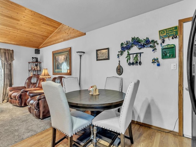 35345 Ew 1240th Rd, Seminole, OK 74868 - dining room with vaulted ceiling, light wood-style floors, baseboards, and wood ceiling