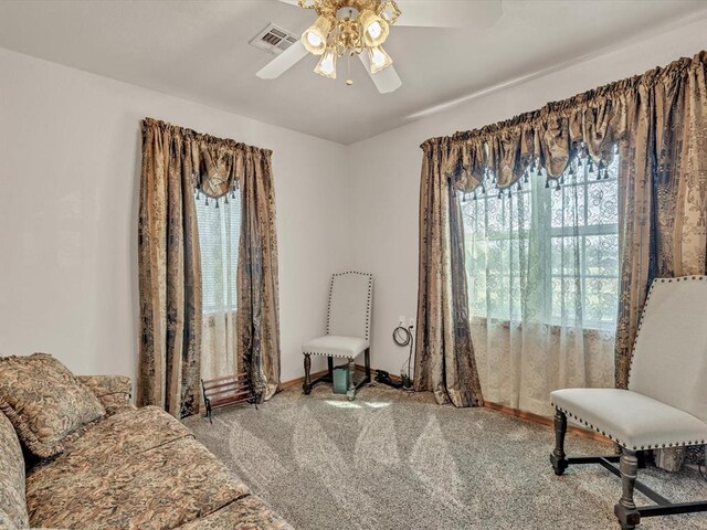 35345 Ew 1240th Rd, Seminole, OK 74868 - sitting room featuring carpet, a ceiling fan, and baseboards