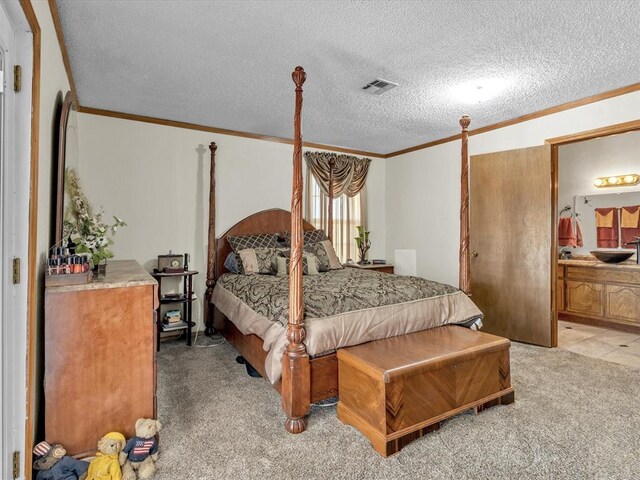 35345 Ew 1240th Rd, Seminole, OK 74868 - bedroom with crown molding, light colored carpet, a sink, a textured ceiling, and connected bathroom
