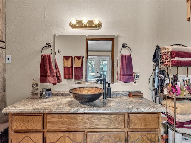 35345 Ew 1240th Rd, Seminole, OK 74868 - bathroom featuring vanity and french doors