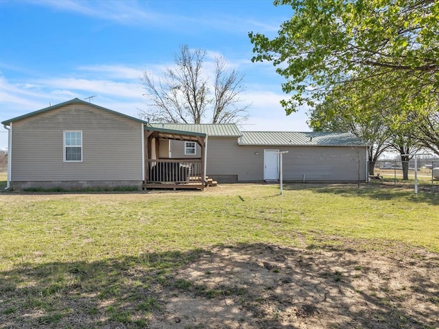 35345 Ew 1240th Rd, Seminole, OK 74868 - rear view of house featuring a deck and metal roof