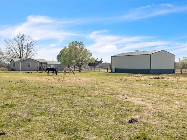 35345 Ew 1240th Rd, Seminole, OK 74868 - view of yard with a pole building, an outbuilding, and a view of countryside