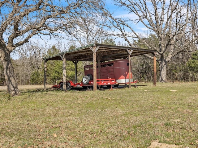 35345 Ew 1240th Rd, Seminole, OK 74868 - view of green lawn with a detached carport
