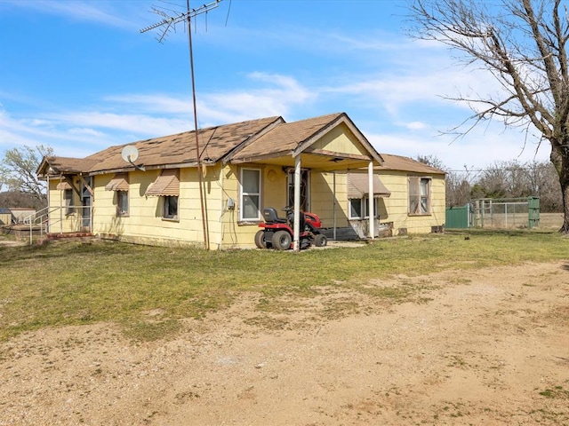 35345 Ew 1240th Rd, Seminole, OK 74868 - rear view of property with a shingled roof