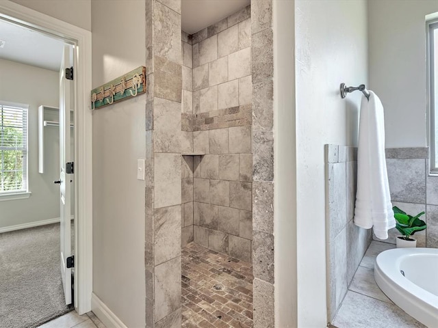10740 Starboard Way, Edmond, OK 73025 - bathroom featuring tiled shower and a tub