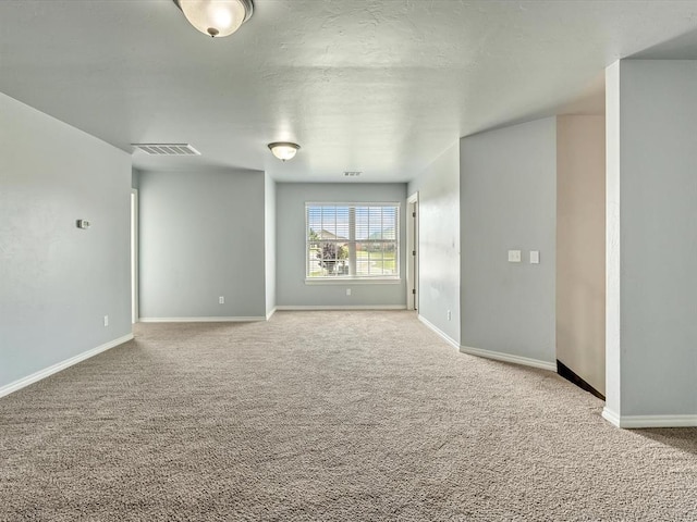 10740 Starboard Way, Edmond, OK 73025 - spare room with carpet